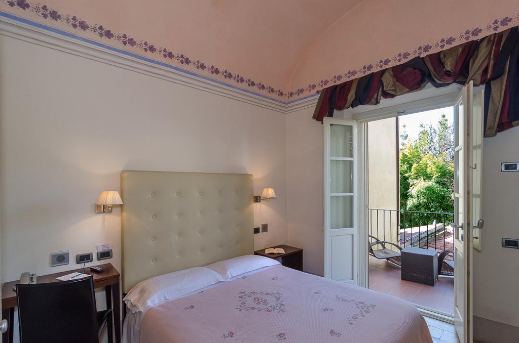 Hotel Novecento ปิซา ภายนอก รูปภาพ