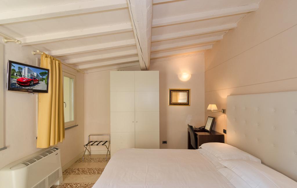 Hotel Novecento ปิซา ภายนอก รูปภาพ